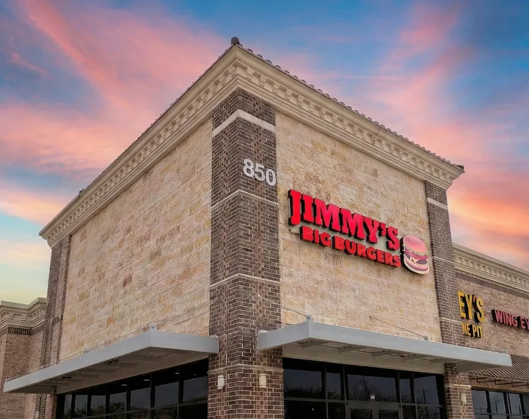 Jimmy's Big Burgers storefront in Little Elm, TX at sunset